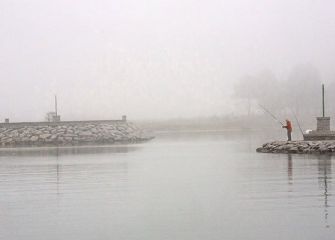 Pescador en la niebla